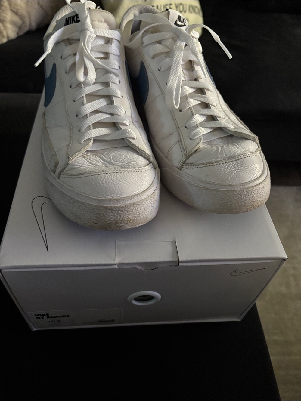 Nike White Sneakers with Blue Swoosh